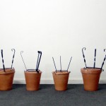 Invisible visible, 2013. Ceramic, metal and baked clay pots, 50 x 35 x 35 cm.