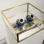 François Bucher&Lina López. Le Temps qui reste, 2014. Glass bell glasses with photographic lenses, 20 x 20 x 15 cm and  archival pigment print on cotton paper, 18 x 45 cmEd. 3 + 2AP