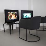 Iconomia, Multichannel Video Installation (2 projections, 2 monitors). (installation view).