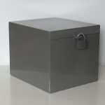 The Bunker, 2014. Shock-proof steel box, photographs, lock, 26 x 29 x 26 cm