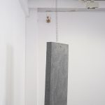 Cuerpo Resonante II, 2023. Grey polystyrene sheet, wire and motor, 95 x 50 x 8 cm