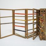 Luz, 2024. Walnut wood support and fabrics dyed with natural dyes. Variable measures (9 frames of 29 x 20 x 1 cm)